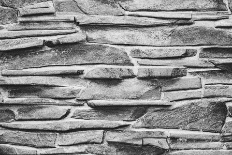 Grey brick wall or road, old stone textured background. 스톡 사진