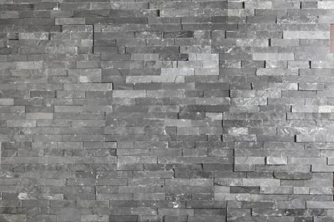 Grey brick wall a Foto stock