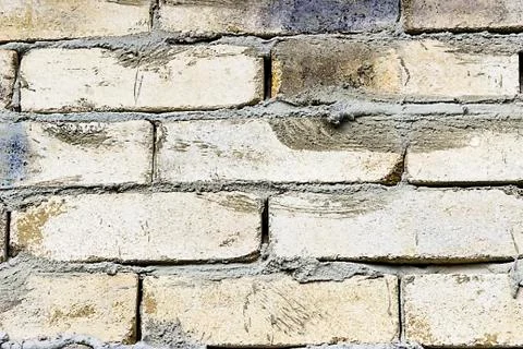 Grey brick wall texture background. Tiled. close- up Stock Photos