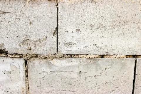 Grey brick wall texture background. Tiled. close- up Stock Photos