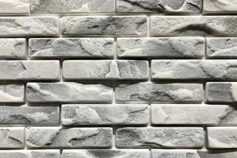 Grey brick wall texture background. Tiled with cope space Foto stock