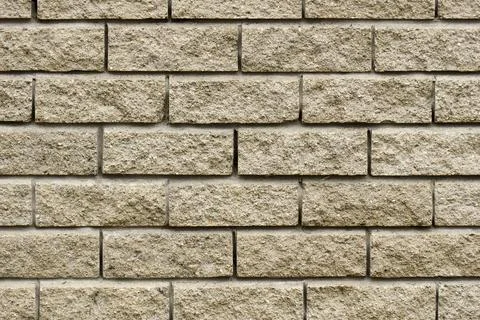 Grey brick wall texture background for architectural design Stock Photos