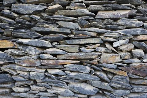Grey bricks slate texture background . Vintage stone wall Stock Photos