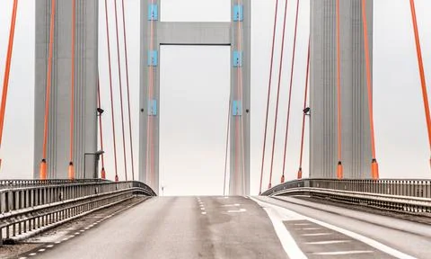 Grey Cable-stayed bridge with orange and blue details.. Stock Photos