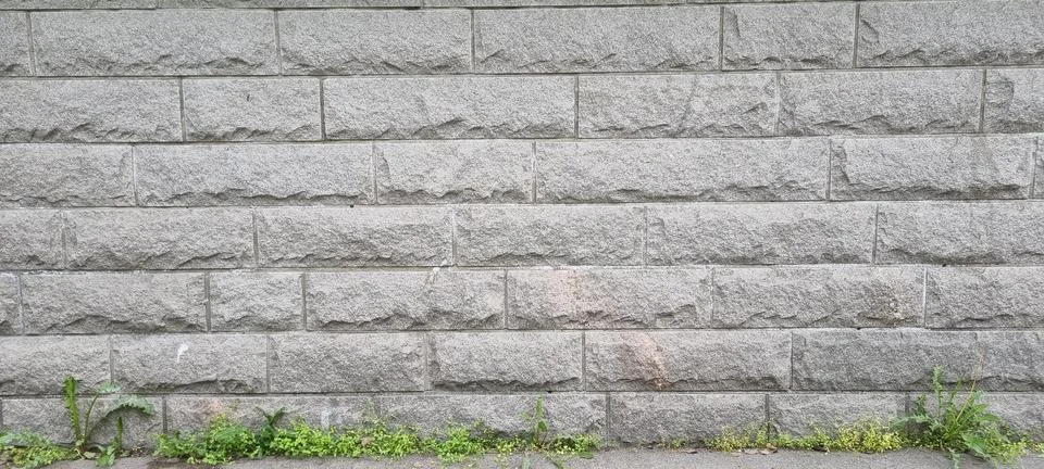 Grey cinder block wall full frame background Stock Photos