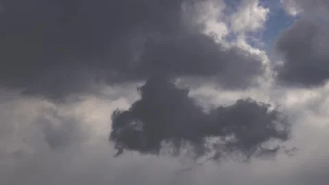 Grey cloud driven by the wind across the sky. Stock Footage 338354263