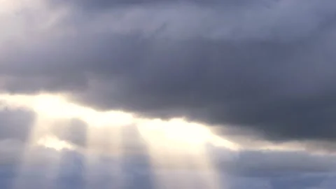 Grey clouds and golden sunbeams -1/8- at sunrise - 4k Time Lapse Video Stock Footage 138196945