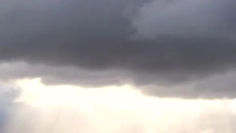 Grey clouds and golden sunbeams -5/8- at sunrise - 4k Time Lapse Video Stock Footage 138203451