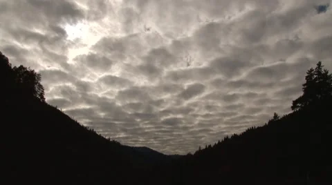 Grey clouds between the mountains Stock Footage 68809106