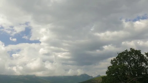 Grey clouds in blue sky, time lapse Stock Footage 79446928
