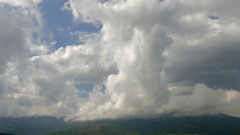 Grey clouds in blue sky, time lapse Stock Footage 79533001