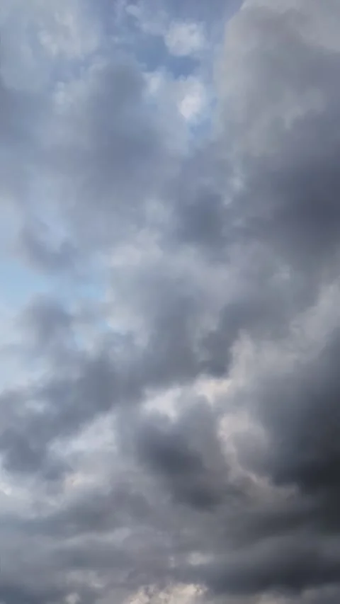 Grey Clouds Covering Blue Sky and White Clouds, vertical video, time-lapse Stock Footage 292447362