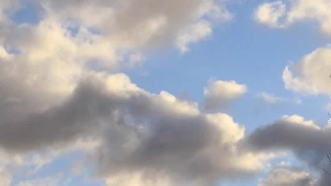 Grey Clouds gathering on a blue sky Stock Footage 169439409