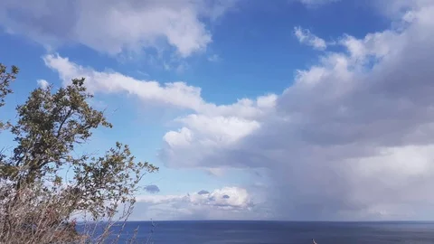 Grey clouds over blue sea Stock Footage 81743010