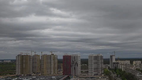 The grey clouds streaming over the residential area. time lapse Video stock 130895981