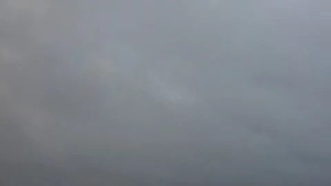 Grey Clouds Transition to Black in an Evening Sky Stock Footage 301714670