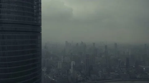 Grey cloudy day looking above Shanghai city skyline with air pollution downtown Stock Footage 168637949