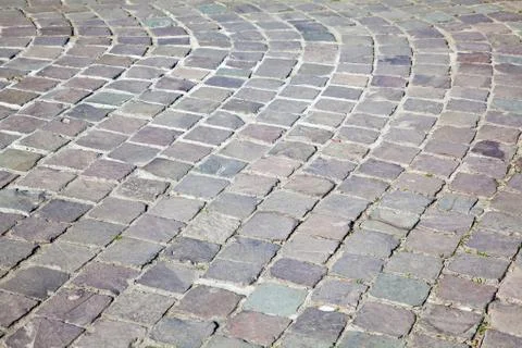 Grey cobblestone boulevard background texture Stock Photos