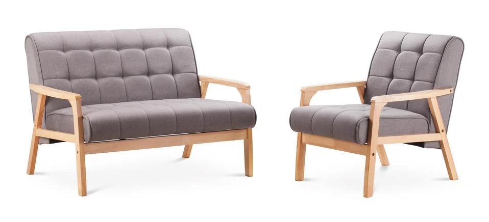 Grey color sofa and grey color armchair. Modern designer sofa and armchair .. Stock Photos