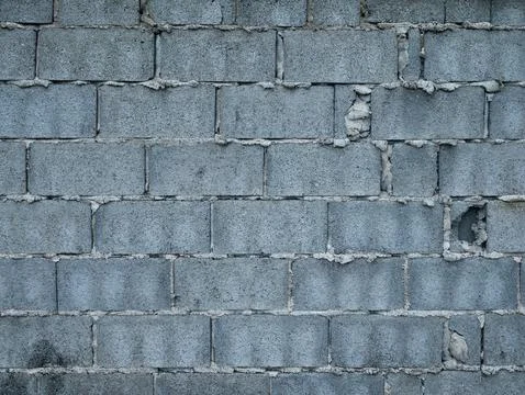 Grey Concrete Block Wall Uniform Pattern Weathered Mortar Damage Natural Li.. Stock Photos