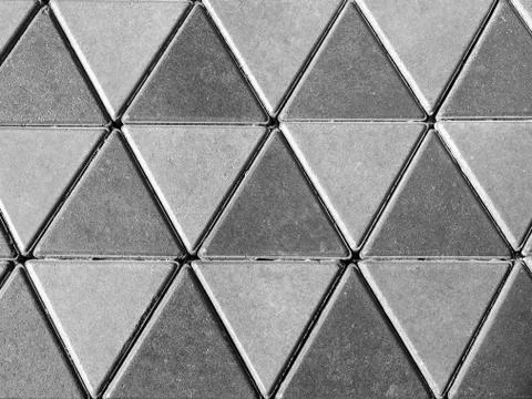 Grey concrete floor, triangle pattern background. Stock Photos