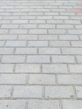 Grey Concrete Paving Slabs Texture on Pedestrian Sidewalk Perspective Stock Photos
