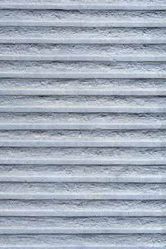 Grey concrete wall with horizontal lines Stock Photos