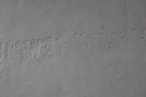 Grey concrete wall texture with rough surface and natural imperfections Stock Photos