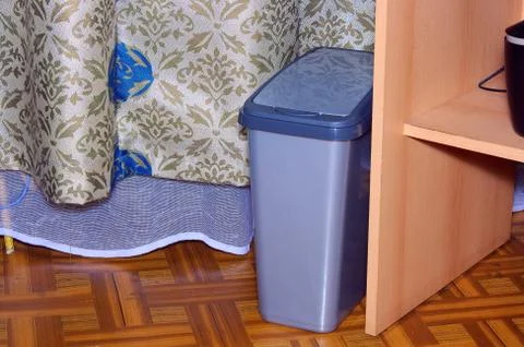 Grey container on garbage Stock Photos