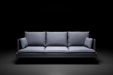 Grey couch with pillows on studio black background. Stock Illustration