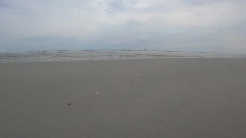 Grey day at the beach Stockbeeldmateriaal 155901054