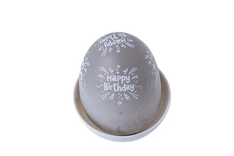 Grey egg shaped kitchen cooking timer isolated on a pure white background Stock Photos
