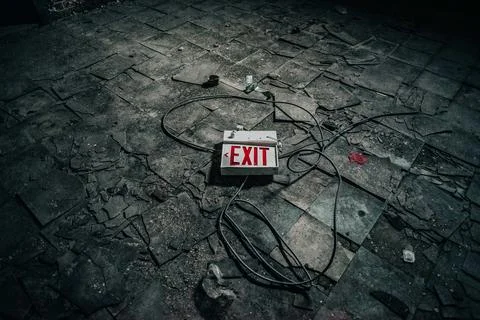 Grey Exit Sign Board on Grey Pavement Stock Photos