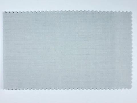 Grey fabric sample Grey fabric sample swatch with zigzag border Copyright:... Stock Photos
