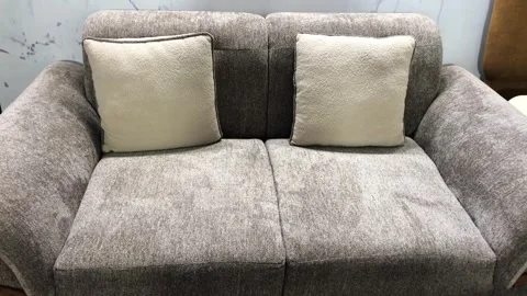 Grey Fabric Sofa with White Cushions | Modern Living Room Furniture 스톡 동영상 344647505