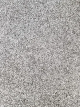 Grey felt fabric texture background with melange effect Stock Photos