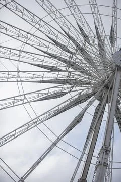 Grey ferris wheel in Paris on a cloud day Stock Photos