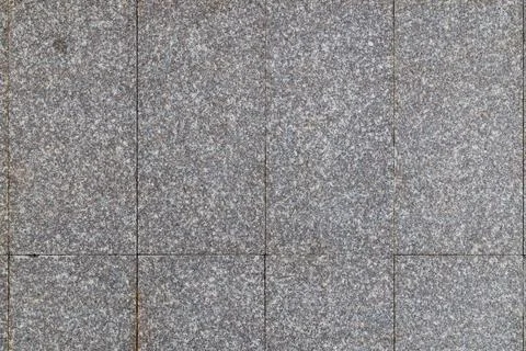 Grey granite rectangular tiles texture and full-frame background Stockfoto's