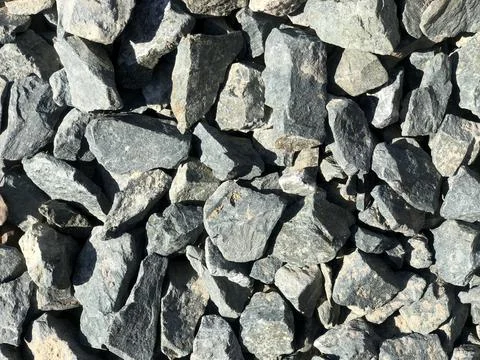 Grey ground stone rubble background of many stones Stock Photos