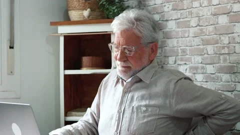 Grey haired middle aged senior male sitting alone in the kitchen on chair s.. Stock Footage 236928669