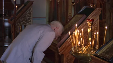 The Grey-Haired Old Man Prays Near an Altar Stock Footage 53503289