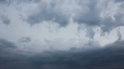 Grey heavy rain clouds time lapse Stock Footage 65990974