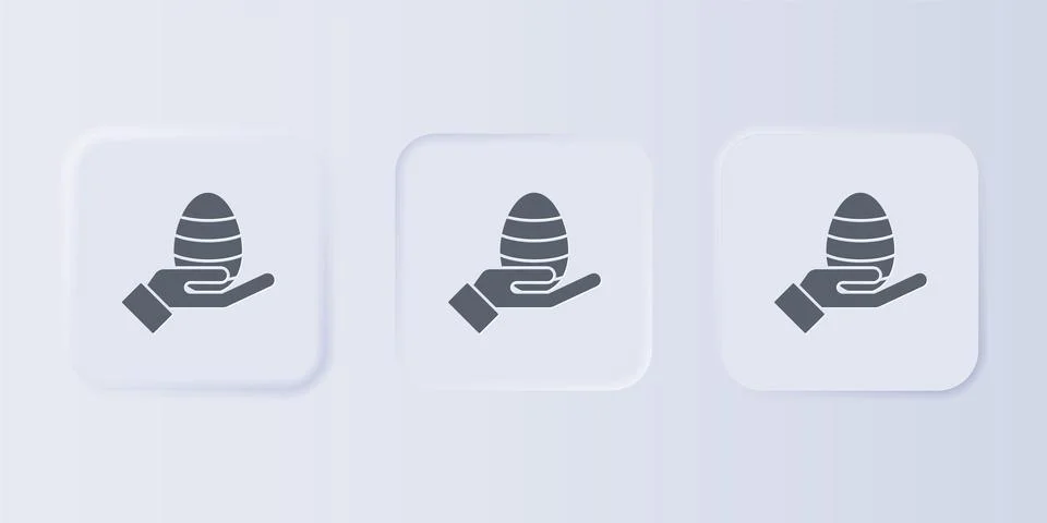 Grey Human hand and easter egg icon isolated on grey background. Happy East.. 스톡 일러스트