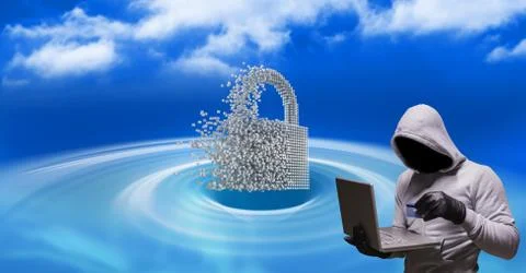 Grey jumper hacker with the computer and the credit card in code sea with lock Stock Photos