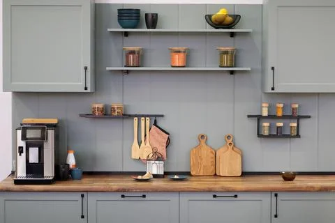 Grey kitchen interior with some kitchen utensils Stock Photos