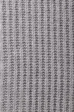 Grey knitted texture Stockfoto's