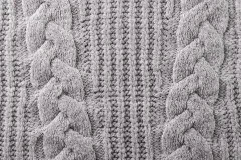 Grey knitted texture Stock Photos