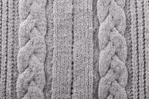 Grey knitted texture Stock Photos