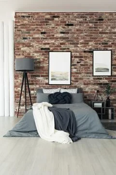 Grey lamp by the bed Stock-Fotos