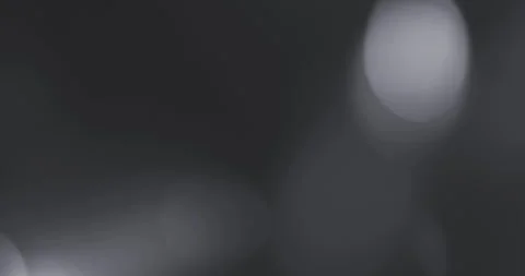 Grey leaks glittering christmas background floating with bokeh, gold holiday Vidéo 328811786